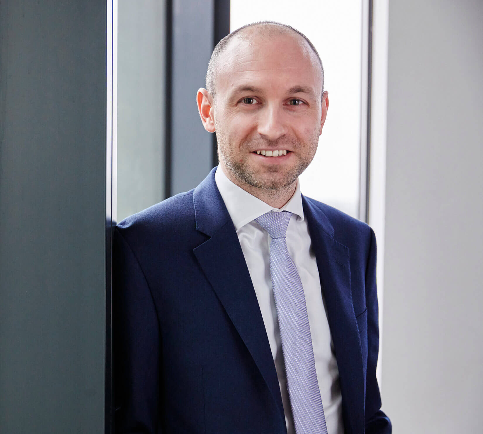 Christopher Deacon, Senior Associate, International Injury, Stewarts }}