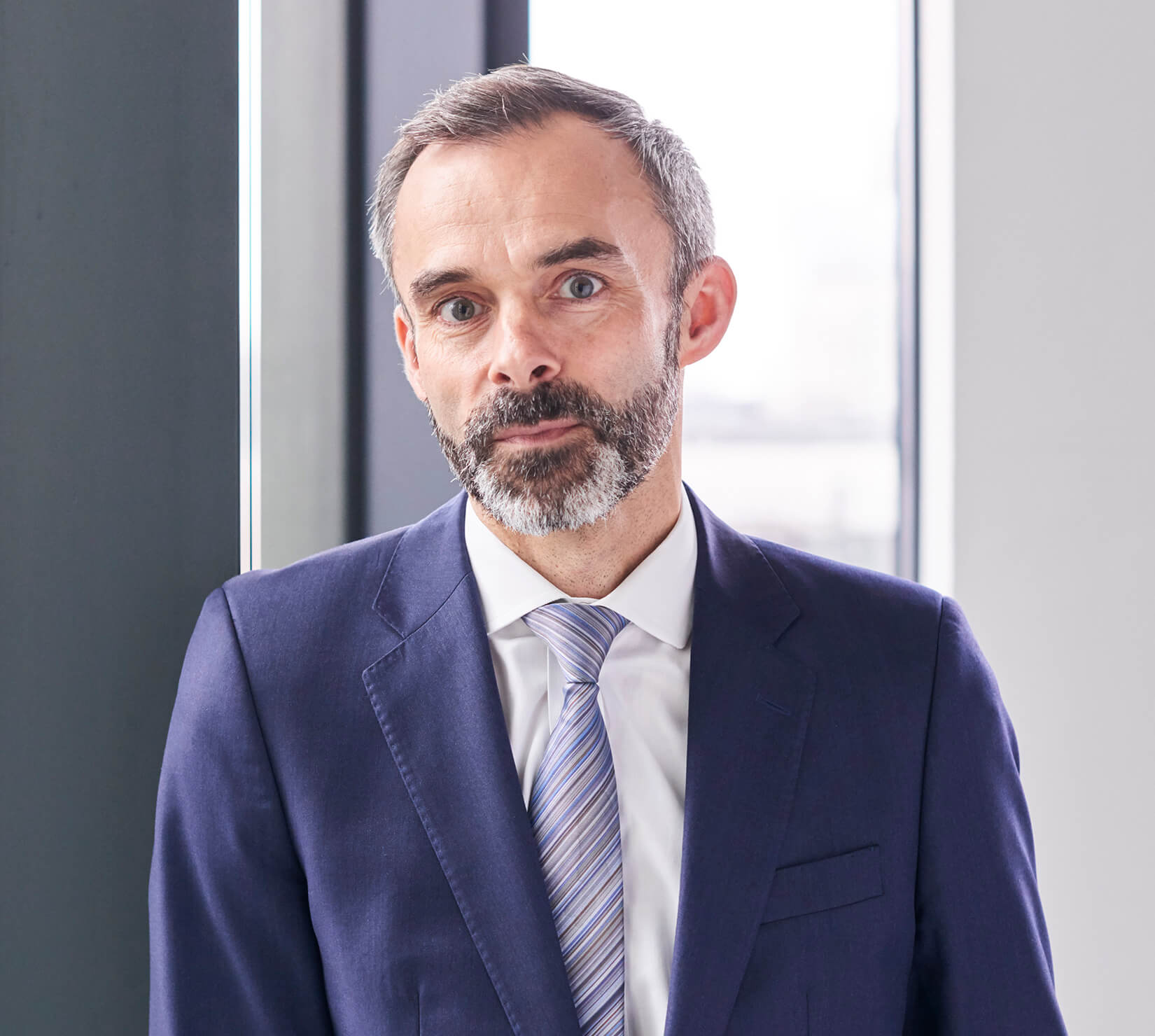 Julian Chamberlayne, Partner, Head of International Injury, Stewarts }}