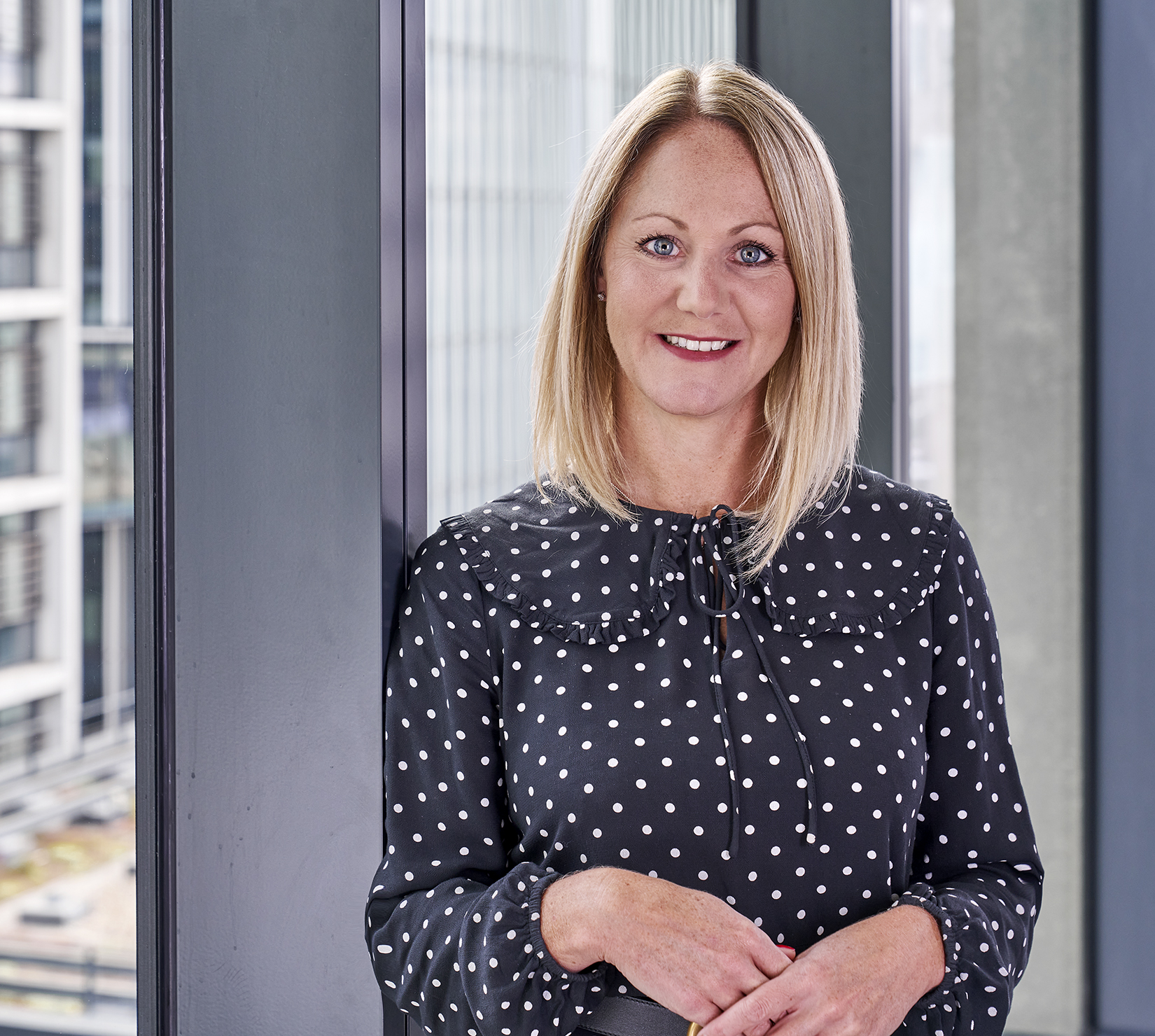 Sam Maher - Marketing Director }}